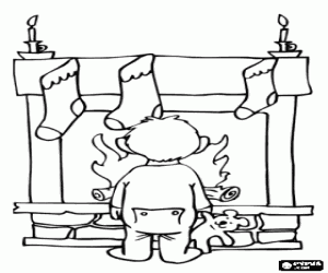 Coloriage Enfant devant la chemin�e avec des bas accroch�s la veille de No�l