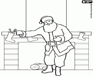 Coloriage P�re No�l en dons dans les chaussetes suspendues de le foyer