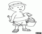 Caillou à la plage avec un chapeau, un flotteur, un seau et une pelle pour le jeu de sable