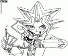 Yugi avec les cartes du jeu Duel de monstres. Yu-Gi-Oh