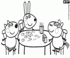 Les Amis de Peppa Pig avec crayons de couleur sur la table