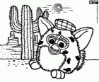 Un Furby et un cactus dans le désert avec les montagnes en arrière-plan