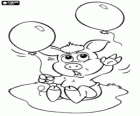 Le petit cochon Astolfo jouant avec deux ballons
