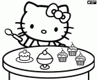Hello Kitty avec une cuillère dans la main prêt à manger des cupcakes, des petits gâteaux délicieux. Hello Kitty aime les bonbons, elle est très gourmande