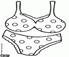 Un ensemble de sous-vêtements féminins. Ensemble de culotte et soutien-gorge orné de pois et dentelle
