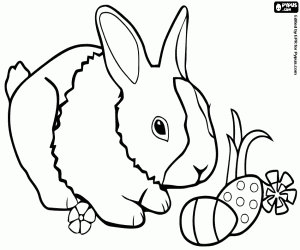 Coloriage Un petit lapin et deux oeufs de Pâques